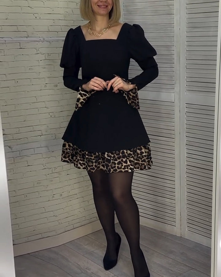 Robe élégante à manches bouffantes et imprimé léopard