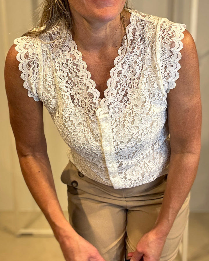 Débardeur élégant sans manches en dentelle avec col en V